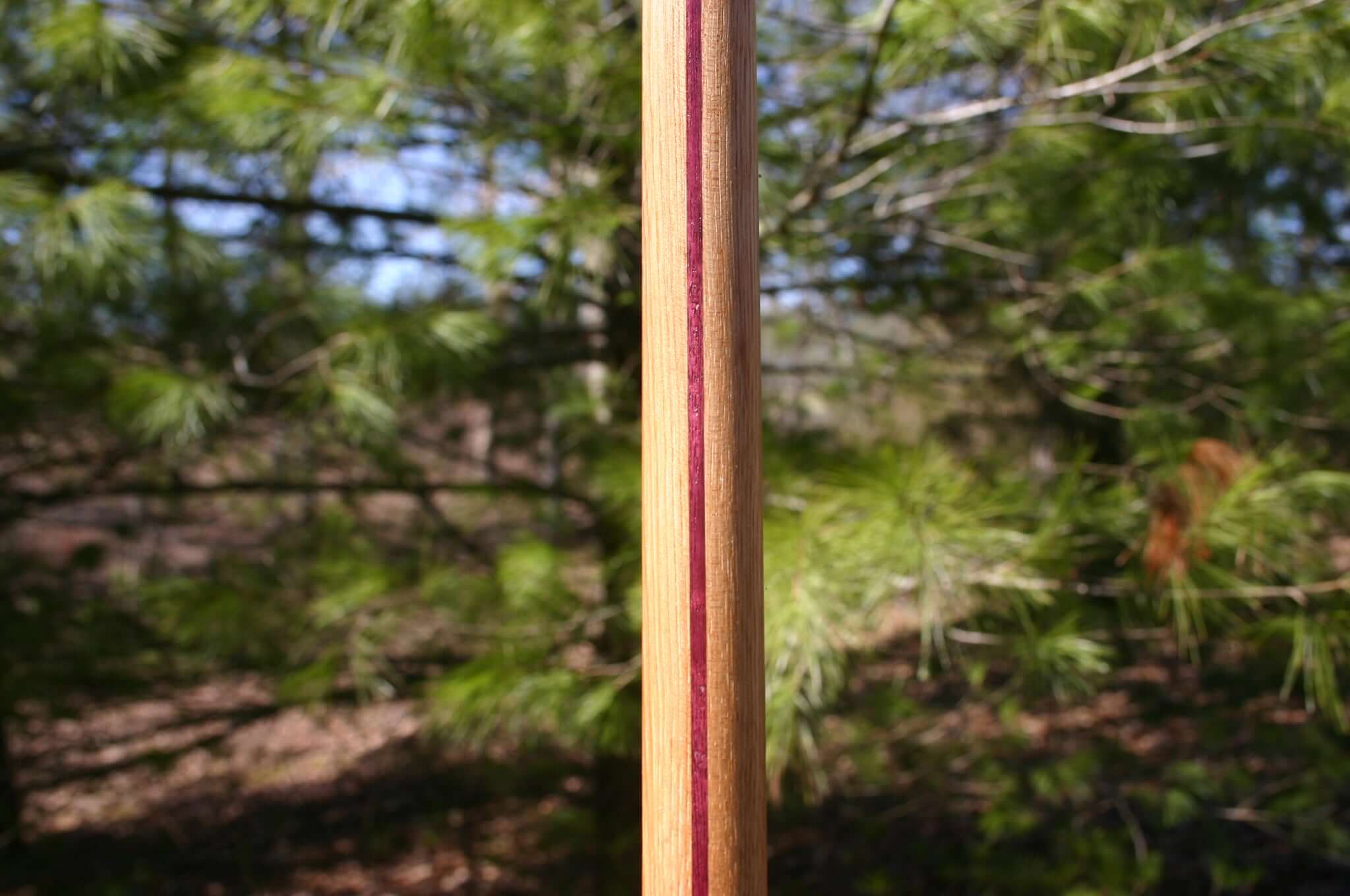 wooden hickory staff with purpleheart strip down the center